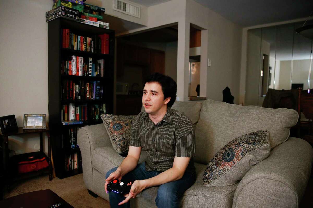 Joshua Zinn, who lives by himself, plays video games at his Galleria area apartment Tuesday, Feb. 20, 2018 in Houston. According to the U.S. Census Bureau, more people live alone now than ever before in American history. (Michael Ciaglo / Houston Chronicle)