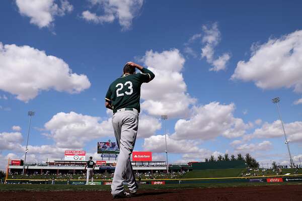 MESA, AZ - FEBRUARY 28:  Matt Joyce #23 of the Oakland Athletics walks out onto the field during the third inning of the spring training game against the Chicago Cubs at Sloan Park on February 28, 2018 in Mesa, Arizona.  (Photo by Christian Petersen/Getty Images)