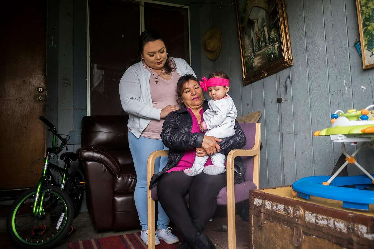 Guadalupe Manzo, Brenda Manzo-Garcia and 9-month-old Nala Manzo photographed at their family home in Napa, CA on March 1, 2018. The family patriarch, 55-year-old Napa resident Jesus Manzo Ceja, was swept up in a recent ICE immigration crackdown that resulted in some 150 Northern California immigrants being arrested.