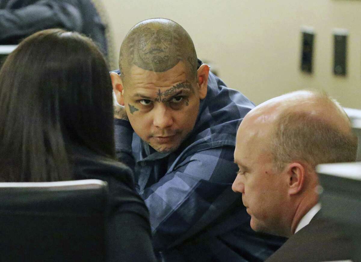 The defendent consults with his attorneys as testimony is heard on February 28, 2018 in the trial of Gabriel Moreno, accused of killing Jose Luis Menchaca.