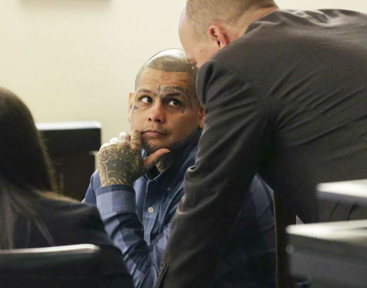 The defendent consults with his attorneys as testimony is heard on February 28, 2018 in the trial of Gabriel Moreno, accused of killing Jose Luis Menchaca.