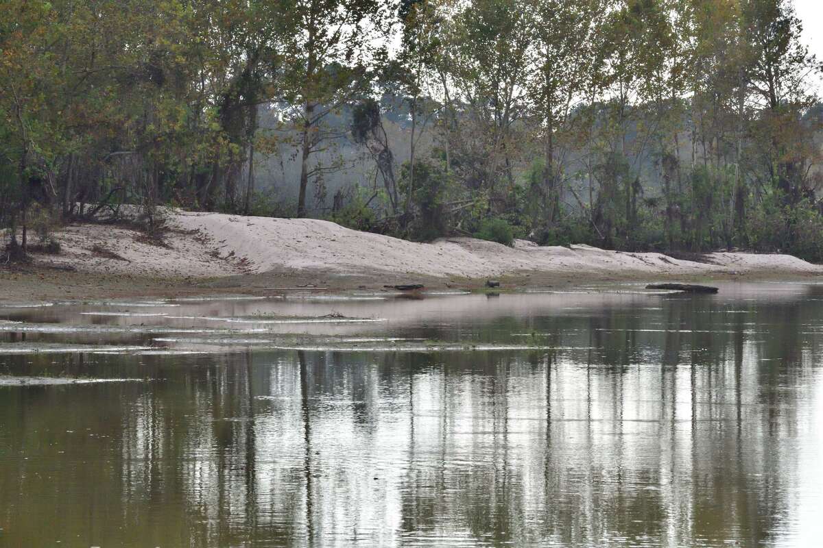 Mounds of sand line the banks of the San Jacinto River near Kingwood after Hurricane Harvey.