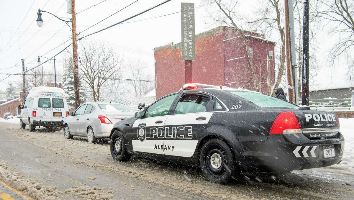 An Albany police officer on patrol during the snow storm on March 2, 2018.