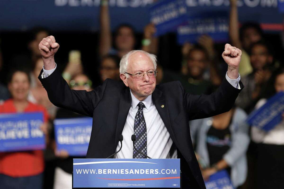 Sen. Bernie Sanders acknowledges his supporters on arrival at a campaign rally during his presidential campaign in this March 2016 file photo.