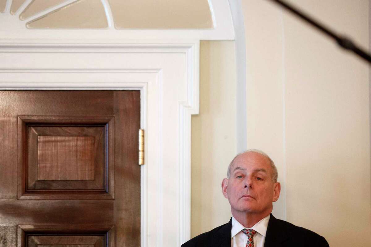 White House Chief of Staff John Kelly listens as President Donald Trump leads a roundtable discussion on foreign trade and steel production with corporate leaders inside the Cabinet Room of the White House in Washington, March 1, 2018. President Trump said on Thursday that he will impose stiff and sweeping tariffs on imports of steel and aluminum as he moved to fulfill a key campaign promise to get tough on foreign competitors. (Tom Brenner/The New York Times)