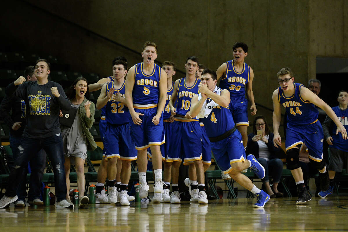 Brock players react to a win against Shallowater in the Region I-3A semi final game March 2, 2018, at Chaparral Center. James Durbin/Reporter-Telegram