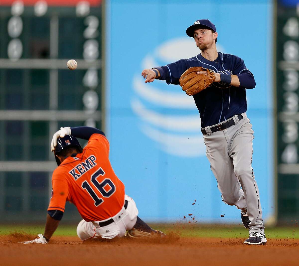 Tampa Bay Rays shortstop Matt Duffy (5) makes the throw to first after tagging Houston Astros Tony Kemp (16) out as Marwin Gonzalez grounded into a double play in the seventh inning of an MLB game at Minute Maid Park, Friday, Aug. 26, 2016 in Houston. ( Karen Warren / Houston Chronicle )