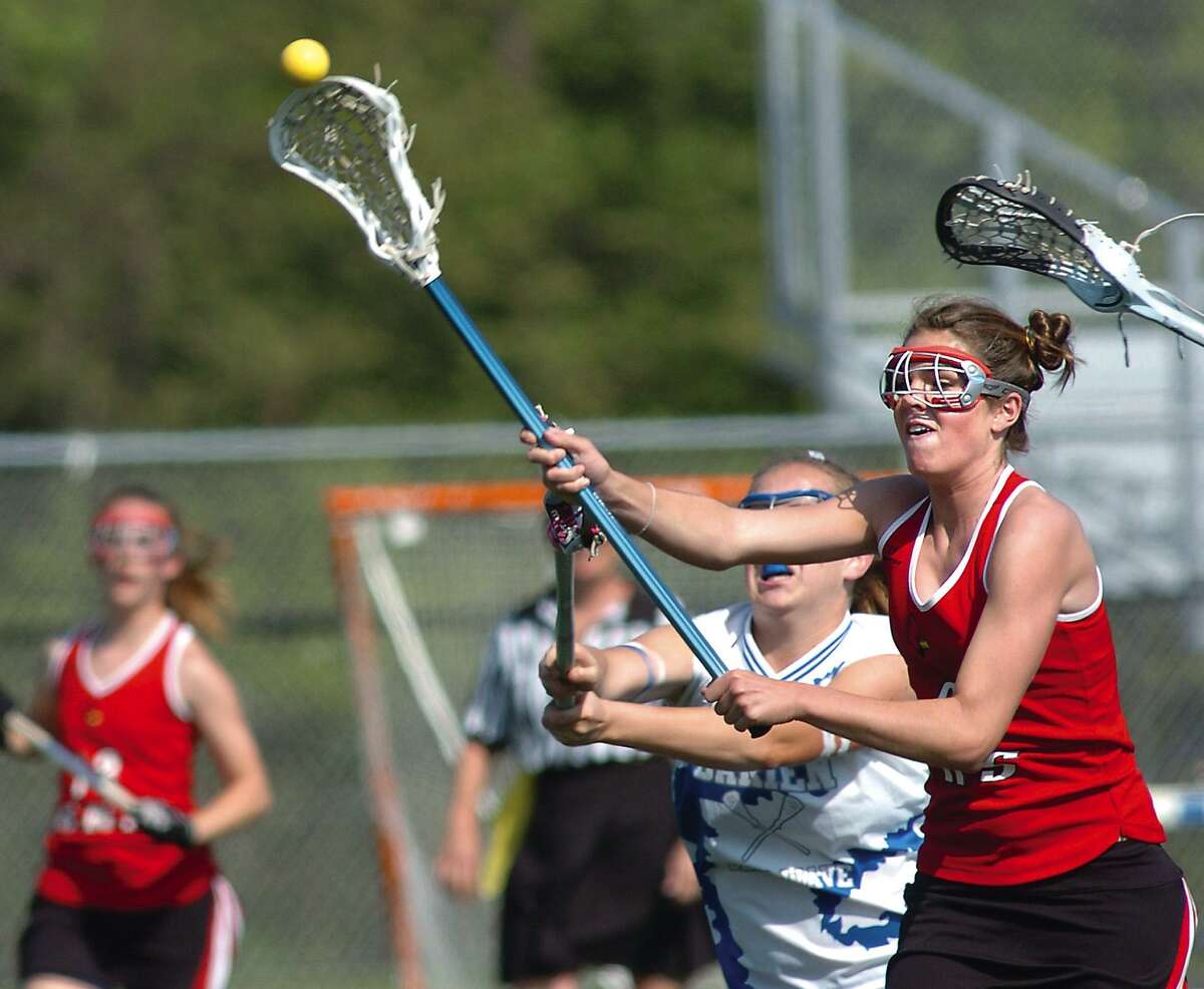 Hope Hicks, right, scores the second goal of the game for Greenwich High School against Darien High School in this 2005 file photo.
