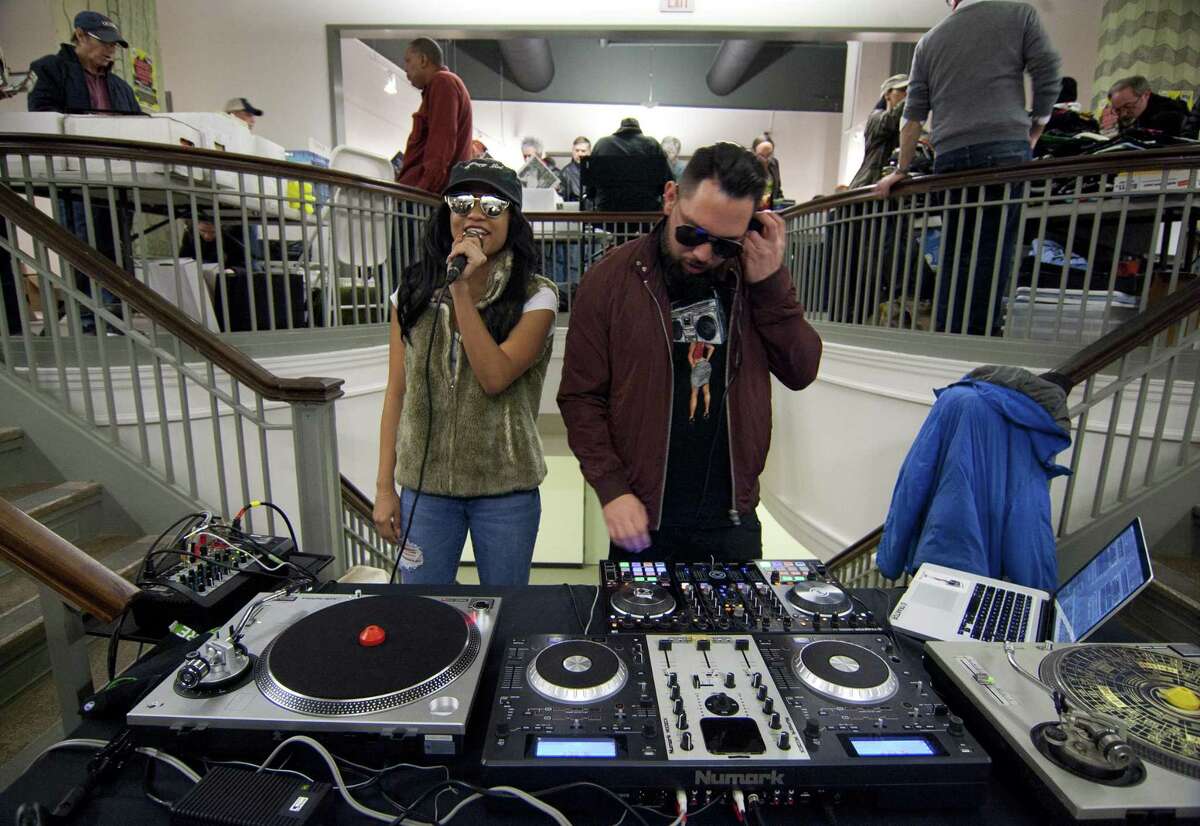 DJ Mystery Girl and DJ Enigma, right, entertain people attending WPKN's MUSIC MASH Record Fair 2018 at Read's Artspace building on Broad Street in Bridgeport, Conn., on Saturday, Mar. 3, 2018. MUSIC MASH 2018 featured 50+ vendors from all over New England selling vinyl LP's, 45's, CD's and music collectibles.