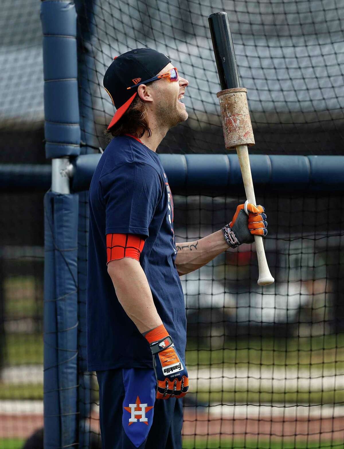 Josh Reddick, with Spider-Man shirt sleeve visible, waits to hit during a recent batting practice. The right fielder had a solid regular season and ALDS, but was 5-for-49 in the ALCS and World Series.