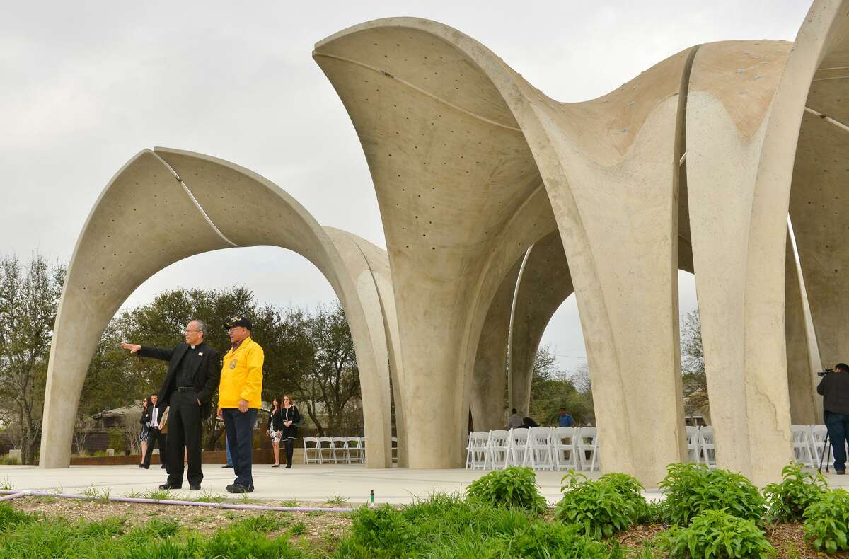 Father David Garcia and John Rodriguez look over Confluence Park during the grand opening Saturday. The 3.5-acre park, a project led by the San Antonio River Foundation, is south of downtown at 310 W. Mitchell St., where San Pedro Creek connects to the river just northwest of Mission Concepción. In planning stages since 2012 and under construction since May 2016, it is a $13 million project supported with public and private funds.