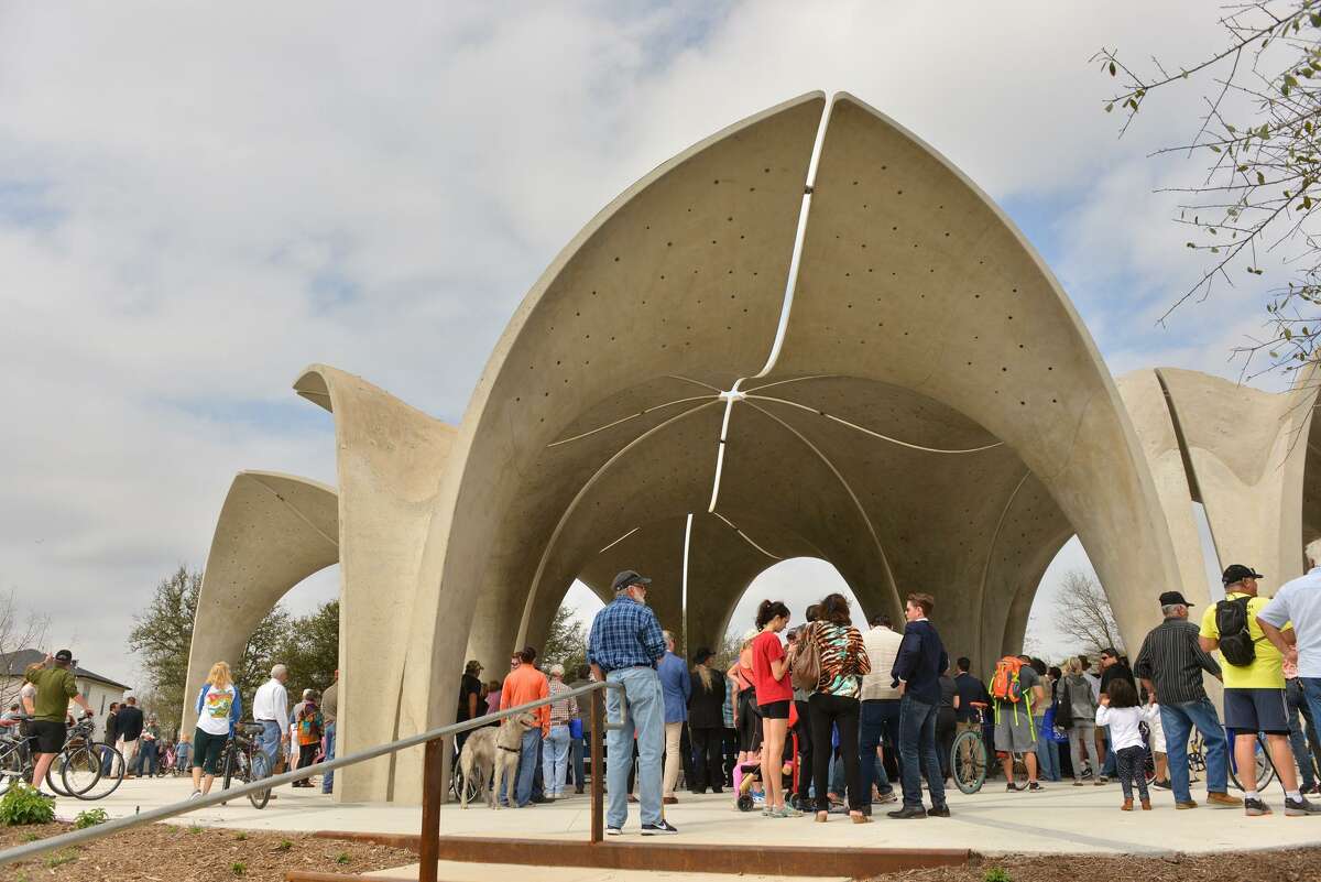 A crowd gathered in the main pavilion during the grand opening of Confluence Park in 2018. The park also has an education building and paths that lead to the San Antonio River’s Mission Reach.