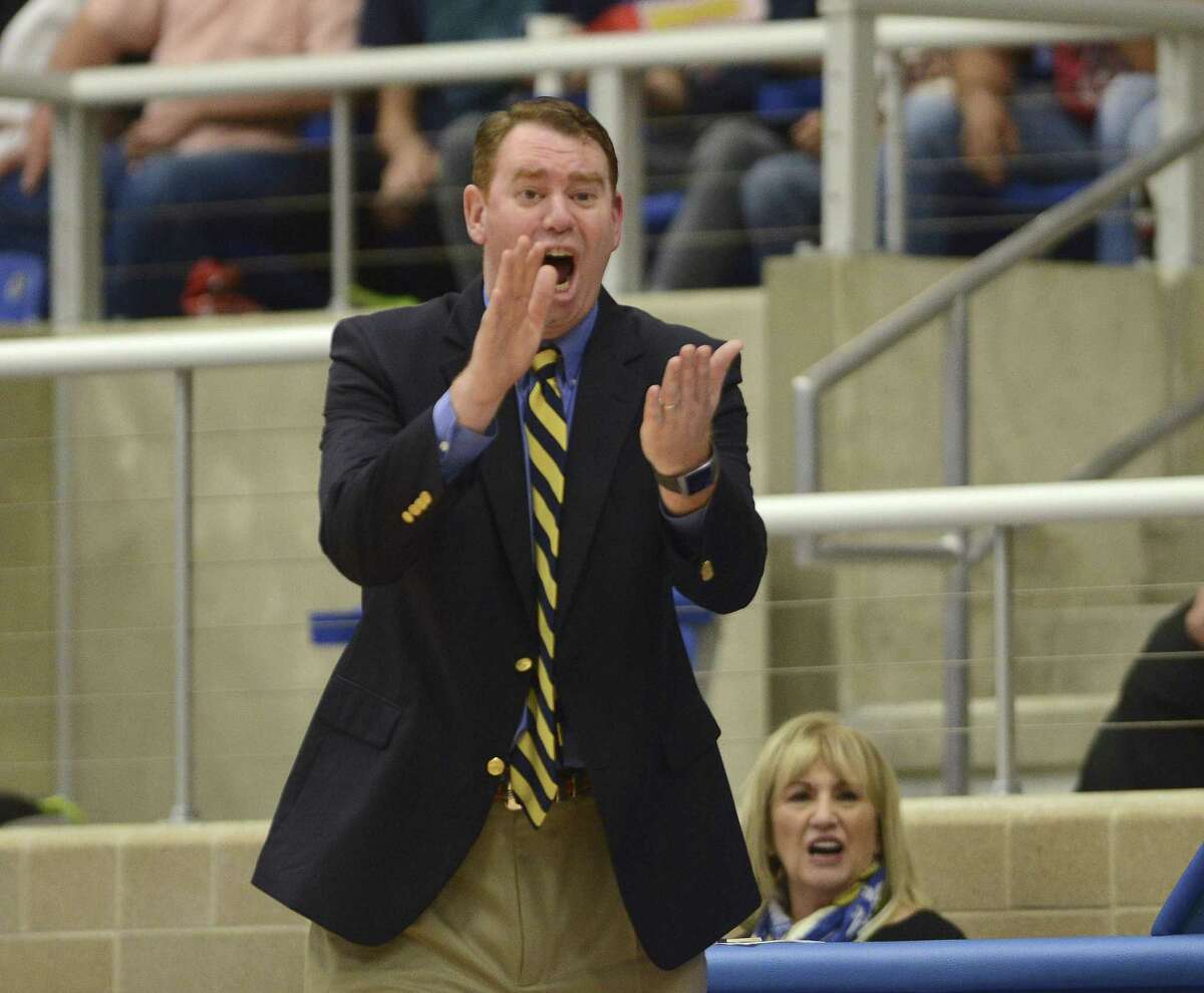 Alamo Heights head basketball coach Andrew Brewer encourages his team during UIL Region IV-5A boys basketball finals action against Laredo Nixon at the Northside ISD Gym on Saturday, March 3, 2018.