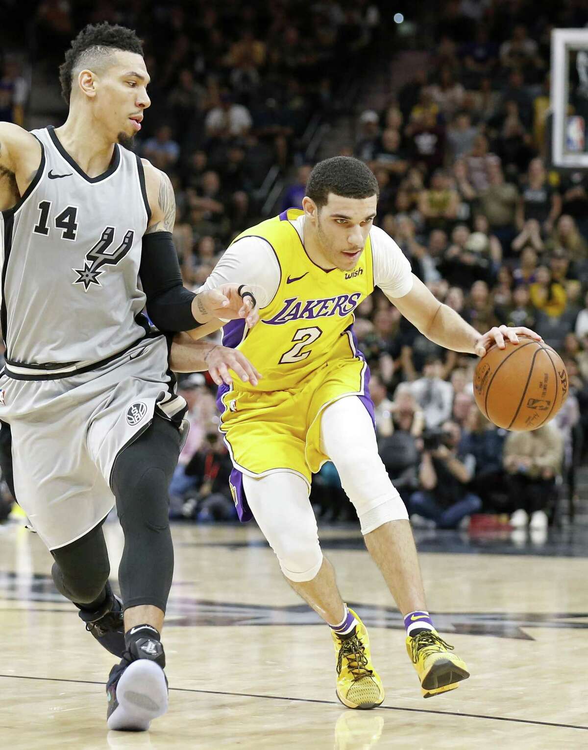 San Antonio Spurs guard Danny Green (14) defends Los Angeles Lakers guard Lonzo Ball (2) during second half action Saturday March. 3, 2018 at the AT&T Center. The Los Angeles Lakers won 116-112.
