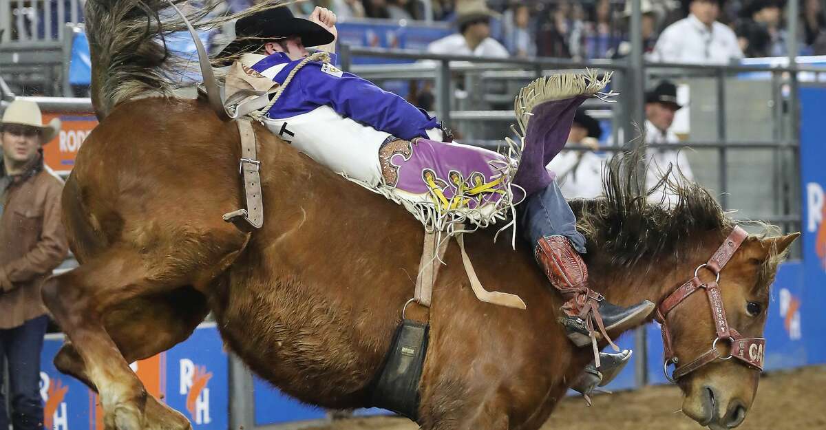 Kaycee Feild rides Tootsie Roll during Super Series II Round 3 Bareback Riding action at Rodeo Houston Sunday, March 4, 2018, in Houston. ( Steve Gonzales / Houston Chronicle )