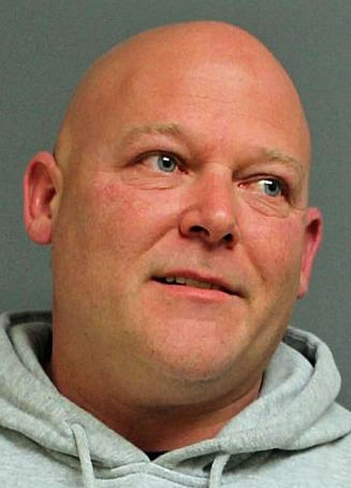 Gregory Bomba, 45, a former fire captain, who lives in Newtown surrendered himself to police in connection with a February fire that occurred during the dinner at Echo Hose Company #1, police said. Bomba was charged with second degree arson, second degree endangerment, second degree criminal mischief and conspiracy. Volunteer firefighter William Tortora, brother of Fire Marshal James “Chic” Tortora, was arrested last week in connection with the fire.