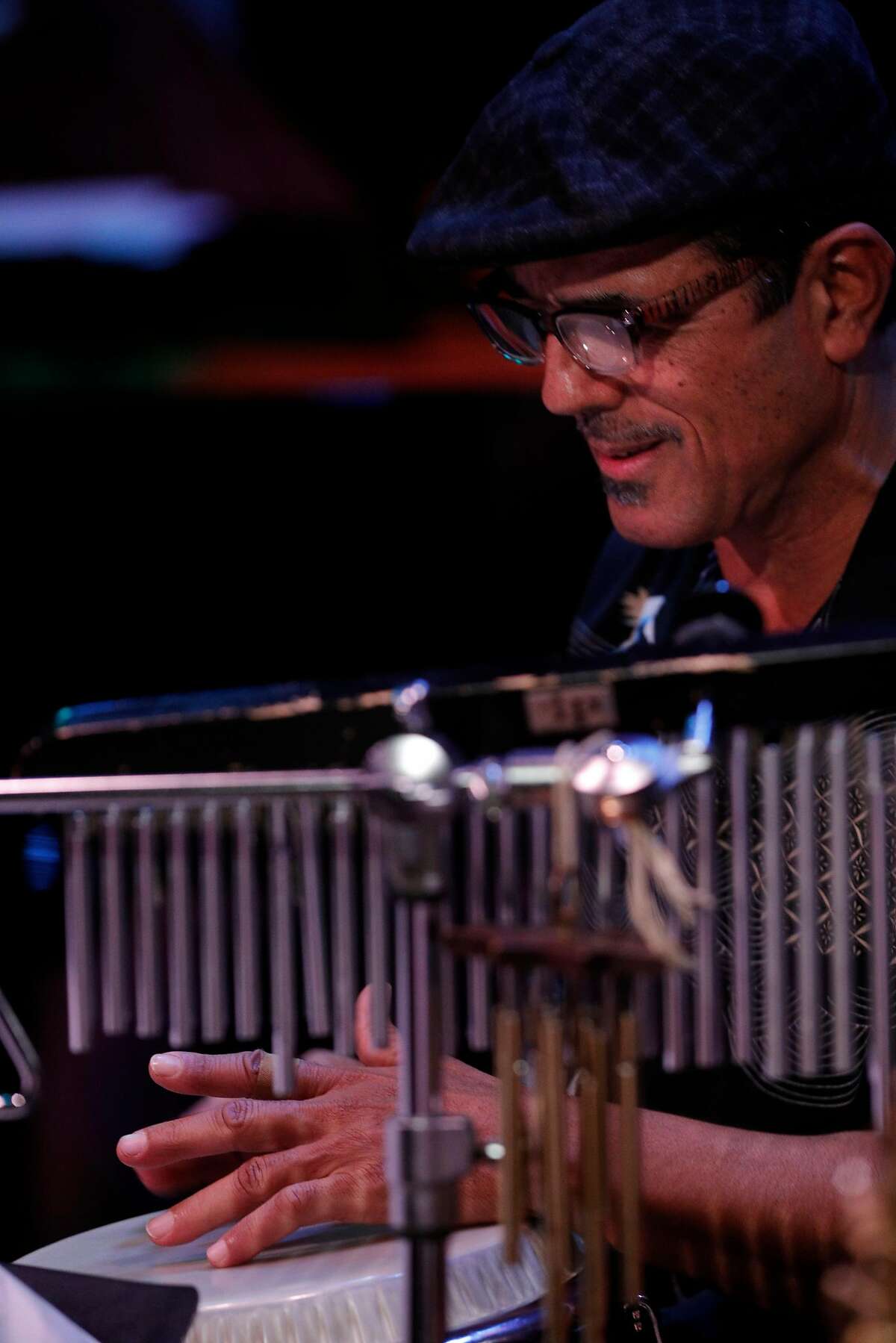 Percussionist John Santos plays with Electric Squeezebox Orchestra during the Cal Jazz Conservatory Fiddler Annex grand opening week final concert in Berkeley, Calif., on Sunday, March 4, 2018. The concert featured the Electric Squeezebox Orchestra, a 17-piece big band led by Erik Jekabson and special guest percussionist John Santos as well as the Cosmic Conquerors, a 14-piece big band, led by Isaiah Hammer.