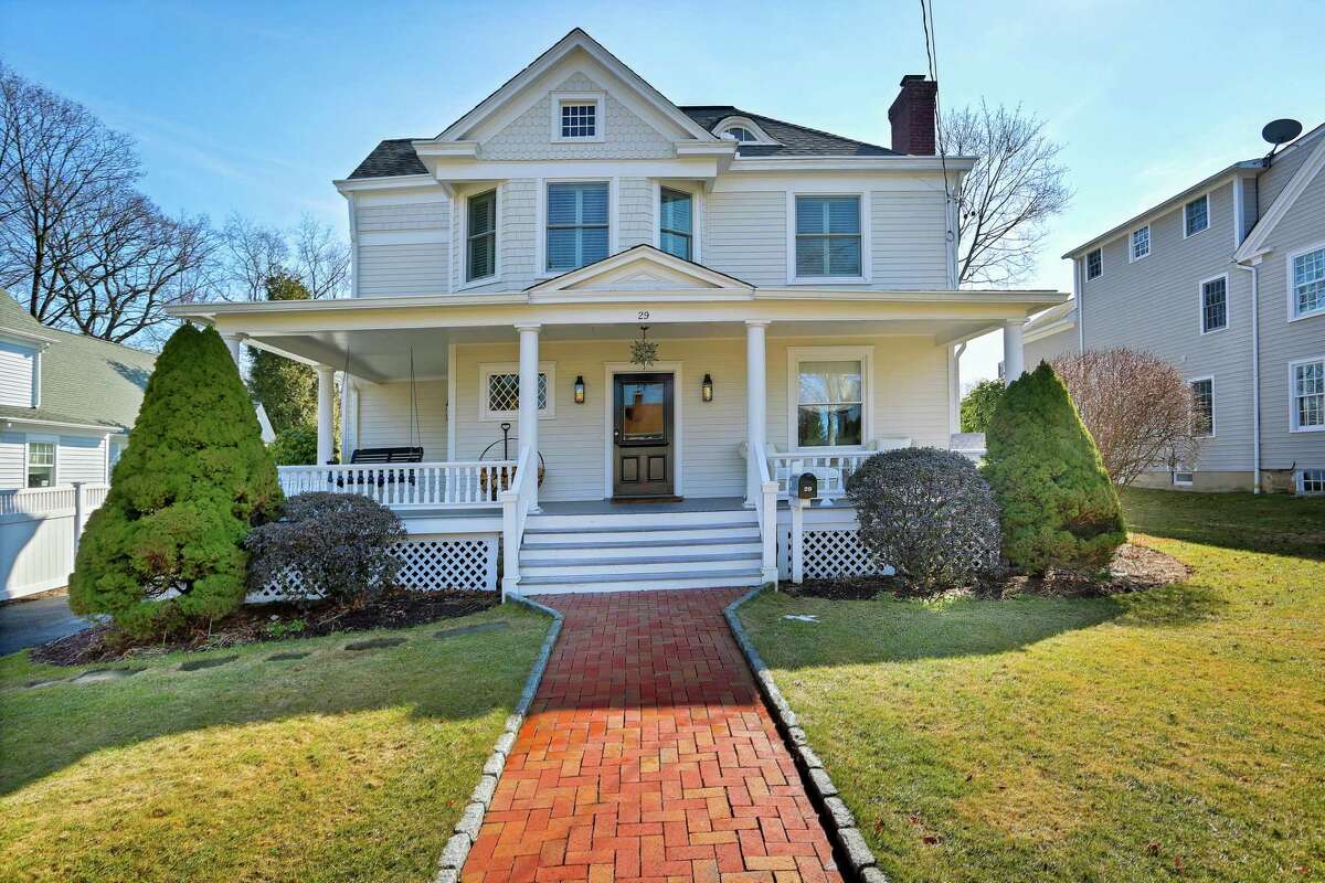 The 12-room Victorian house at 29 Church Street in New Canaan is within walking distance to the Metro North train station and the town center with its shops and restaurants.