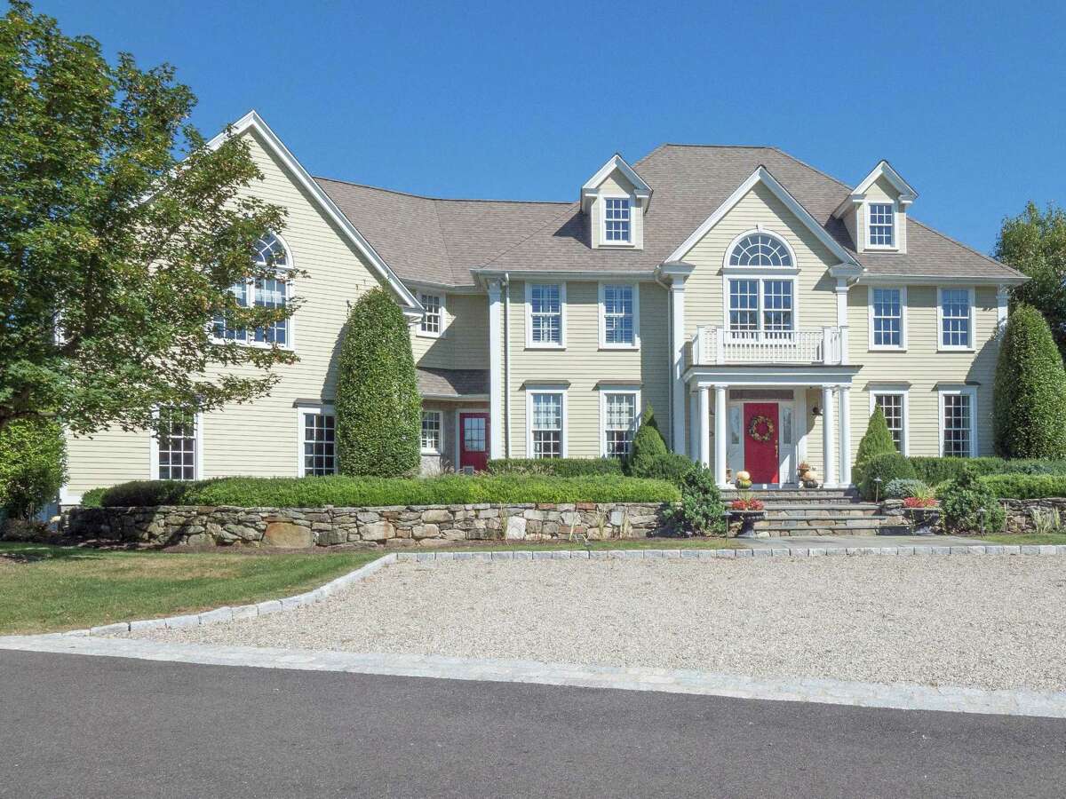 The 5,630-square-foot custom colonial house sits on a property of just over two acres in South Wilton. It adjoins Ambler Farm and Rolling Hills Country Club’s golf course.