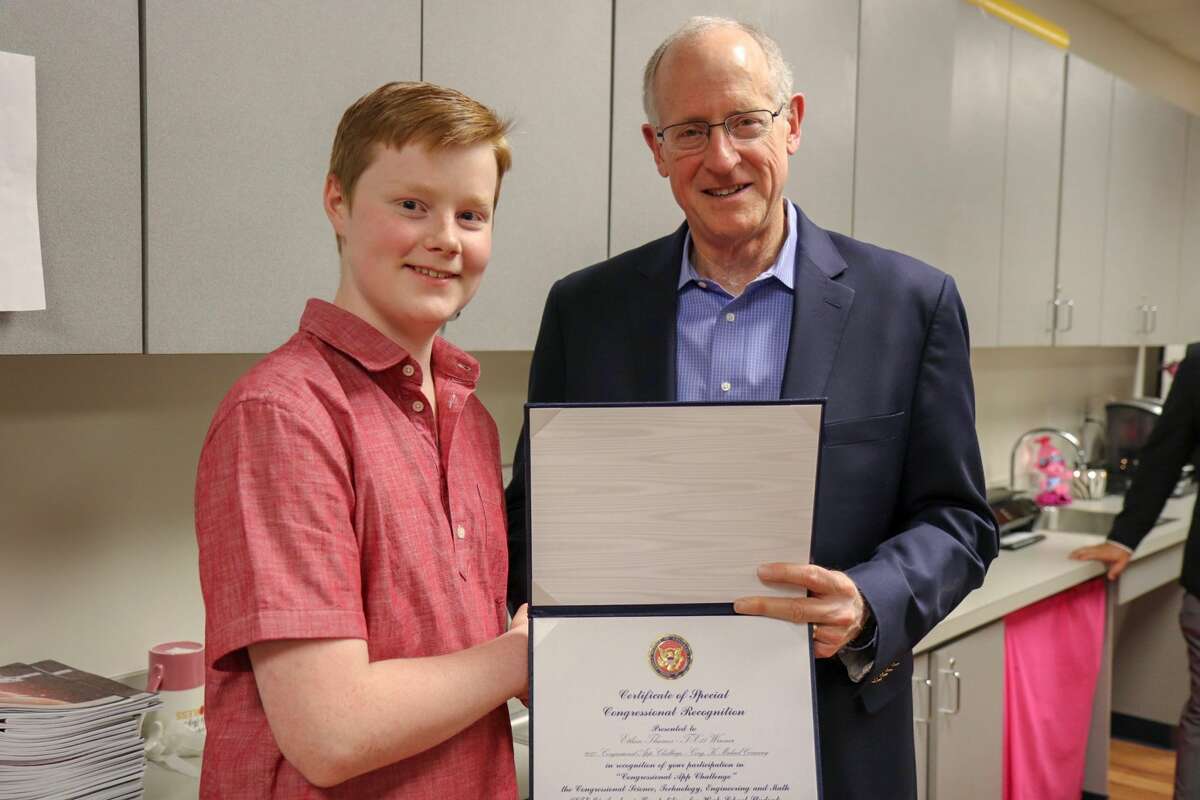 U.S. Rep. Mike Conaway visited Premier High School of Midland on Thursday to present an award to sophomore Ethan Thames as the 11th District’s winner in the Congressional App Challenge.