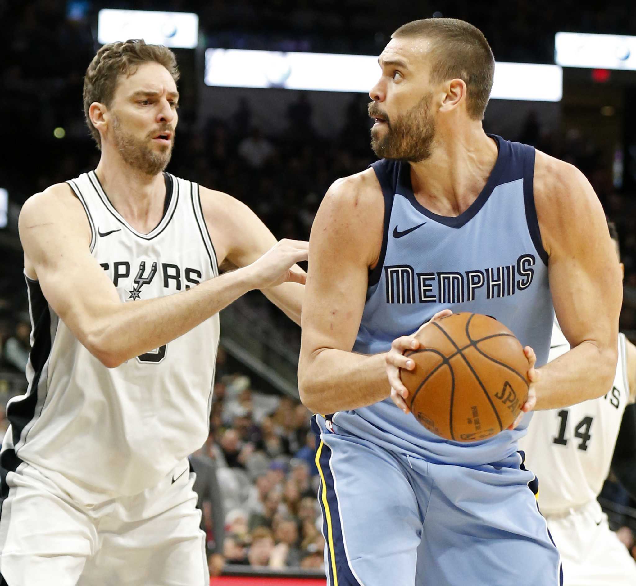 Pau Gasol of San Antonio Spurs suffers shoulder injury after colliding with  brother Marc Gasol of Memphis Grizzlies - ESPN