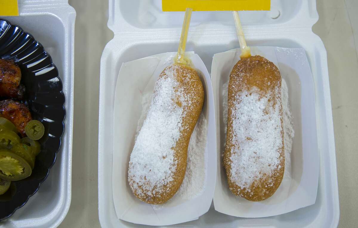 Powdered and fried foods are on display during the judging of the Gold Buckle Foodie Awards in the Main Club of NRG Center, Monday, Feb. 26, 2018, in Houston. Judges tasted food that is available to the general public throughout the carnival and rodeo in several categories from "best dessert" to "most creative."