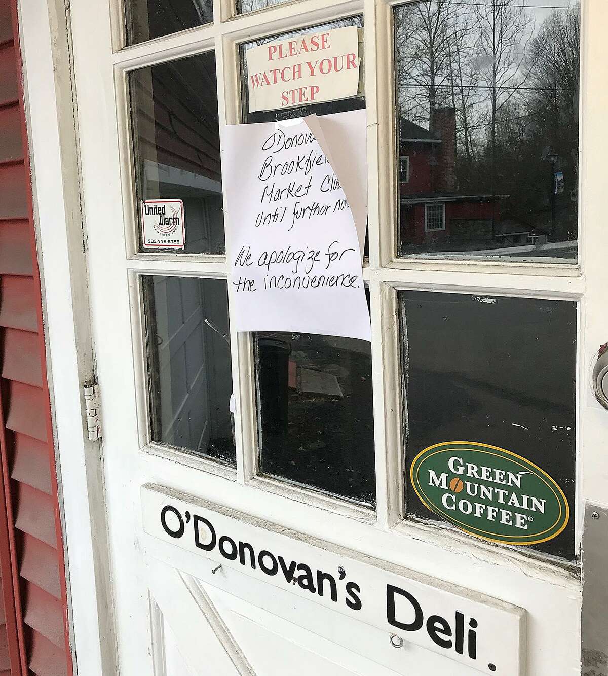 A sign on the door reads that O'Donovan's Deli is closed on Monday, March 5, 2018, in Brookfield, Conn.