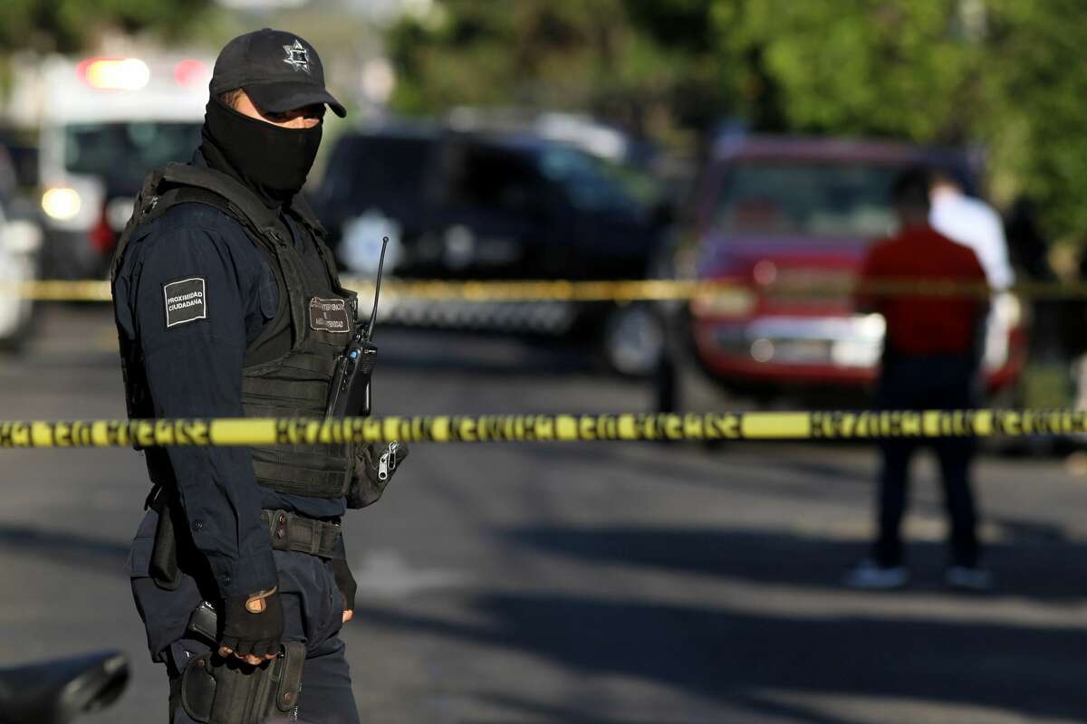 Officials said Wednesday eight hacked-up bodies were found in a pickup truck abandoned in the city of Guadalajara.