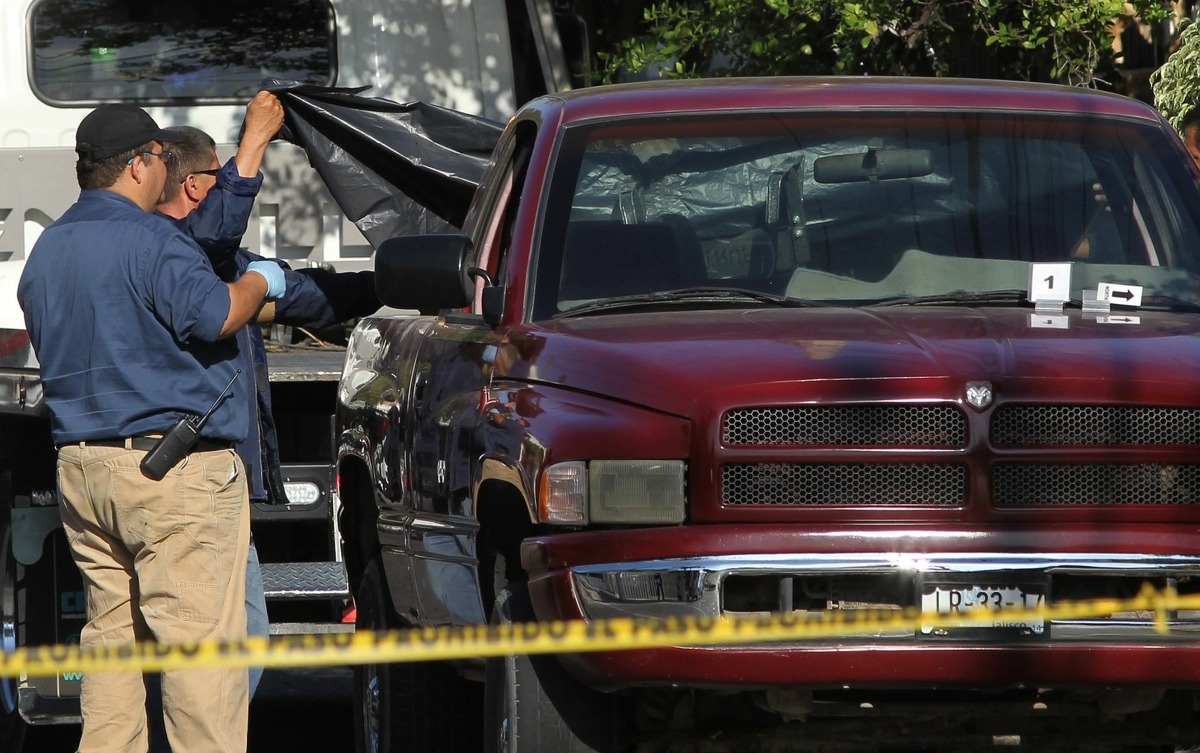 Officials said Wednesday eight hacked-up bodies were found in a pickup truck abandoned in the city of Guadalajara.