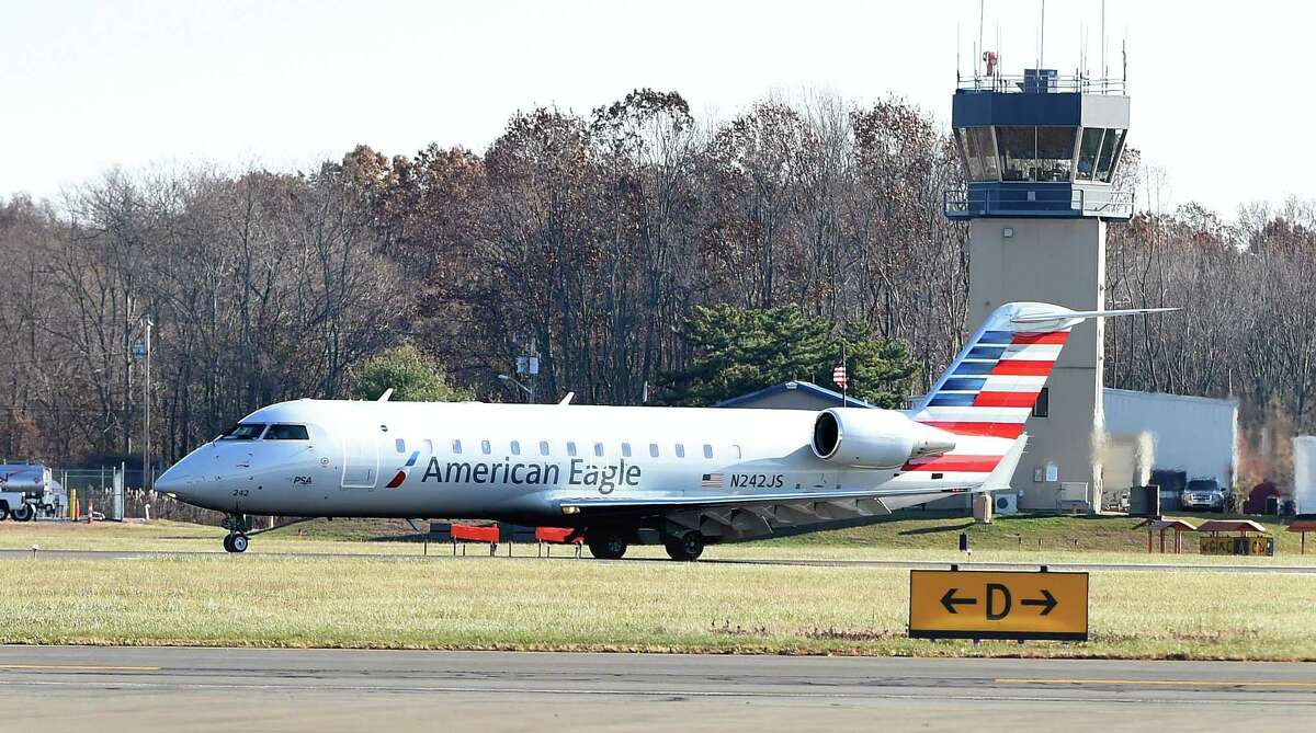 The first American Airlines Canadair RJ 200 regional jet originating in Philadelphia lands at Tweed New Haven Airport in New Haven on November 29, 2017.