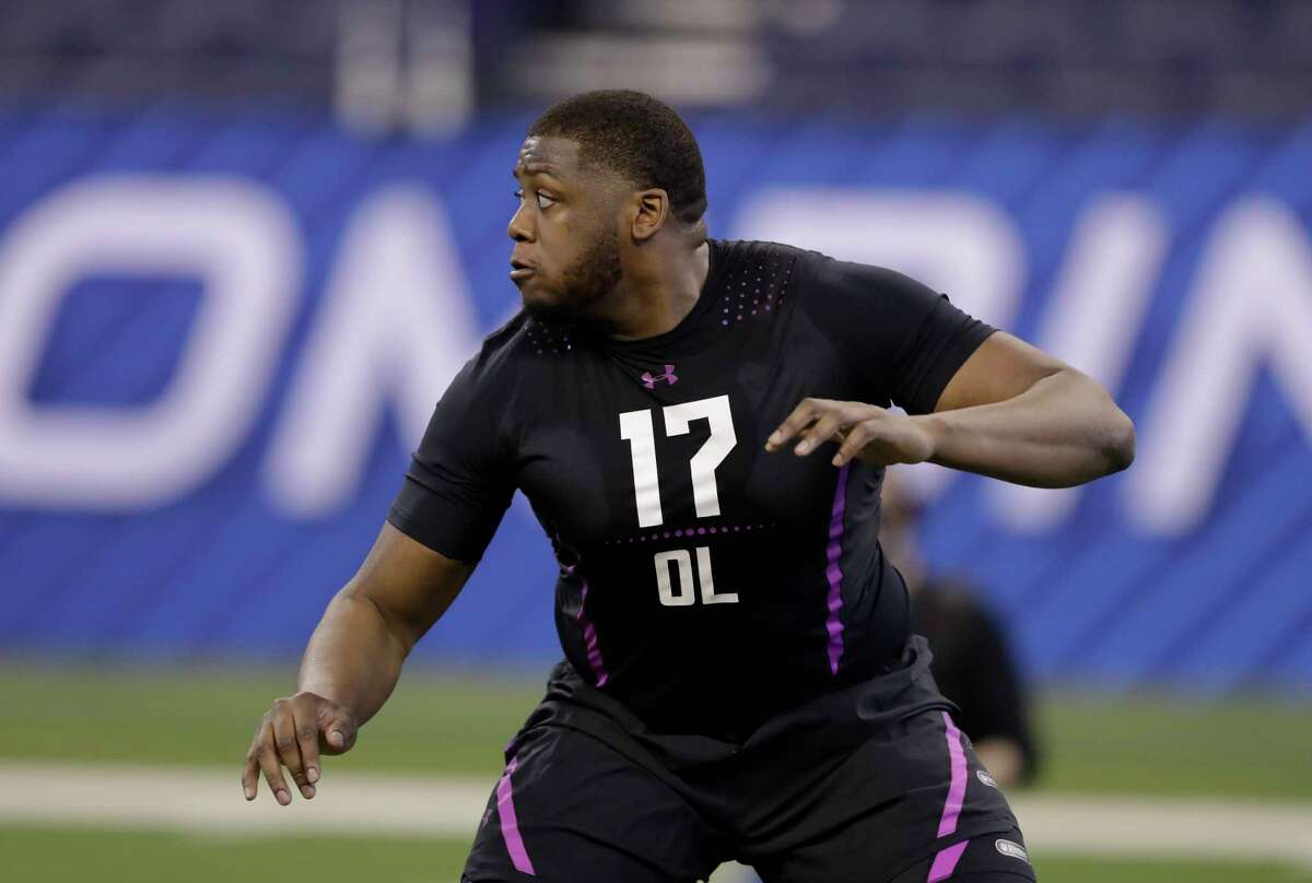 Ohio State offensive lineman Jamarco Jones runs a drill during the NFL football scouting combine, Friday, March 2, 2018, in Indianapolis. (AP Photo/Darron Cummings)