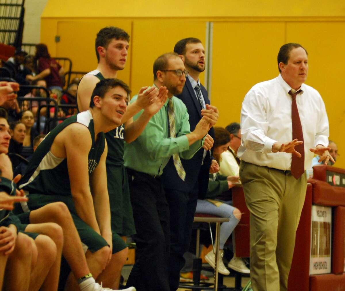 The New Milford bench reacts during a game against New Britain on Tuesday.