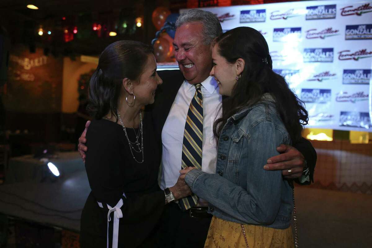 Democratic Bexar County District Attorney candidate Joe Gonzales celebrates with his wife, Yvonne, left, and daughter, Marissa, 17, after taking a commanding lead in early voting results, Tuesday, March 6, 2018. Gonzales looks the early voting with 61-percent over incumbent Nico LaHood who came in with 38-percent.