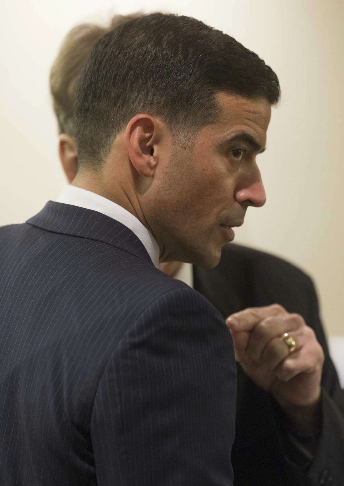 Bexar County District Attorney Nico LaHood talks Tuesday, Jan. 9, 2017 with an assistant district attorney during a trial LaHood is personally prosecuting.