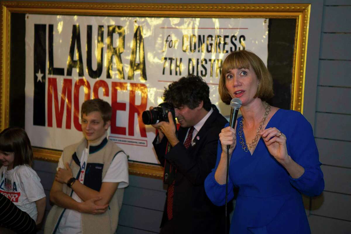 7th District candidate Laura Moser looks up at the incoming election results as she addresses her supporters at a primary campaign party at The West End on Westheimer, Tuesday, March 6, 2018, in Houston.