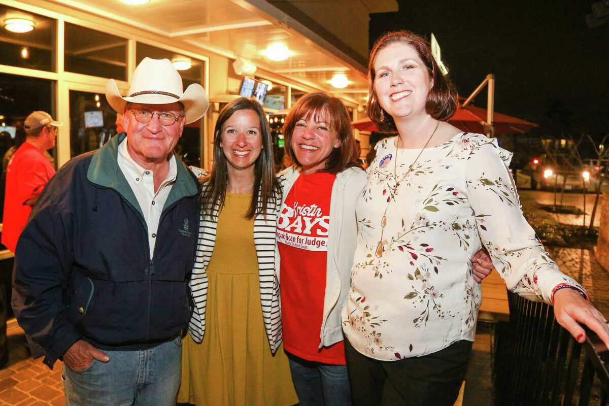 From the left, Mark Keough, Melisa Miller, Kristin Bays and Melanie Bush pose for a photo together on Tuesday, March 6, 2018, at Woodson's.