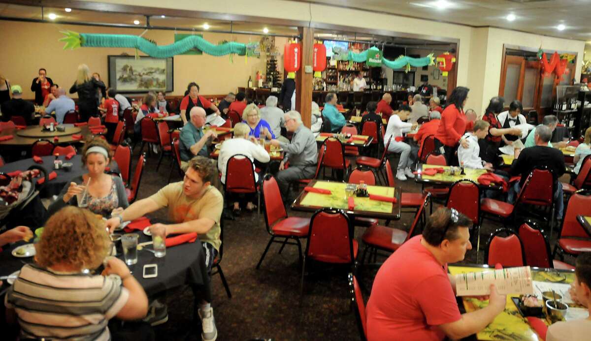 Rocket fans enjoy a pre-game dinner at the China Garden Restaurant on downtown Leland Street on Saturday, March 3, 2018.  (Photo by Dave Rothman)