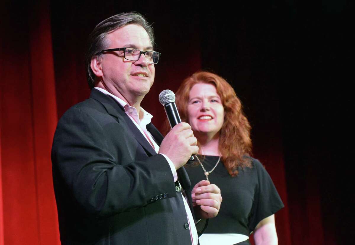 Frank Farricker, the Greenwich-based developer of the Wall Street Theater in Norwalk, Conn., speaks in May 2018 at a grand opening performance featuring performers from Broadway, accompanied by Suzanne Cahill, president of the theater.