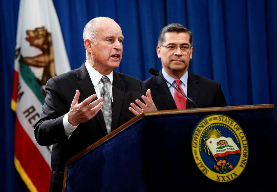 California Governor Edmund G. Brown Jr. (left) joins Attorney General Xavier Becerra at a press conference at the State Capitol in Sacramento, Calif. on Wed. March 7, 2018, to discuss U.S. Attorney General Jeff Sessions� decision to sue the State of California. Photo: Michael Macor, The Chronicle