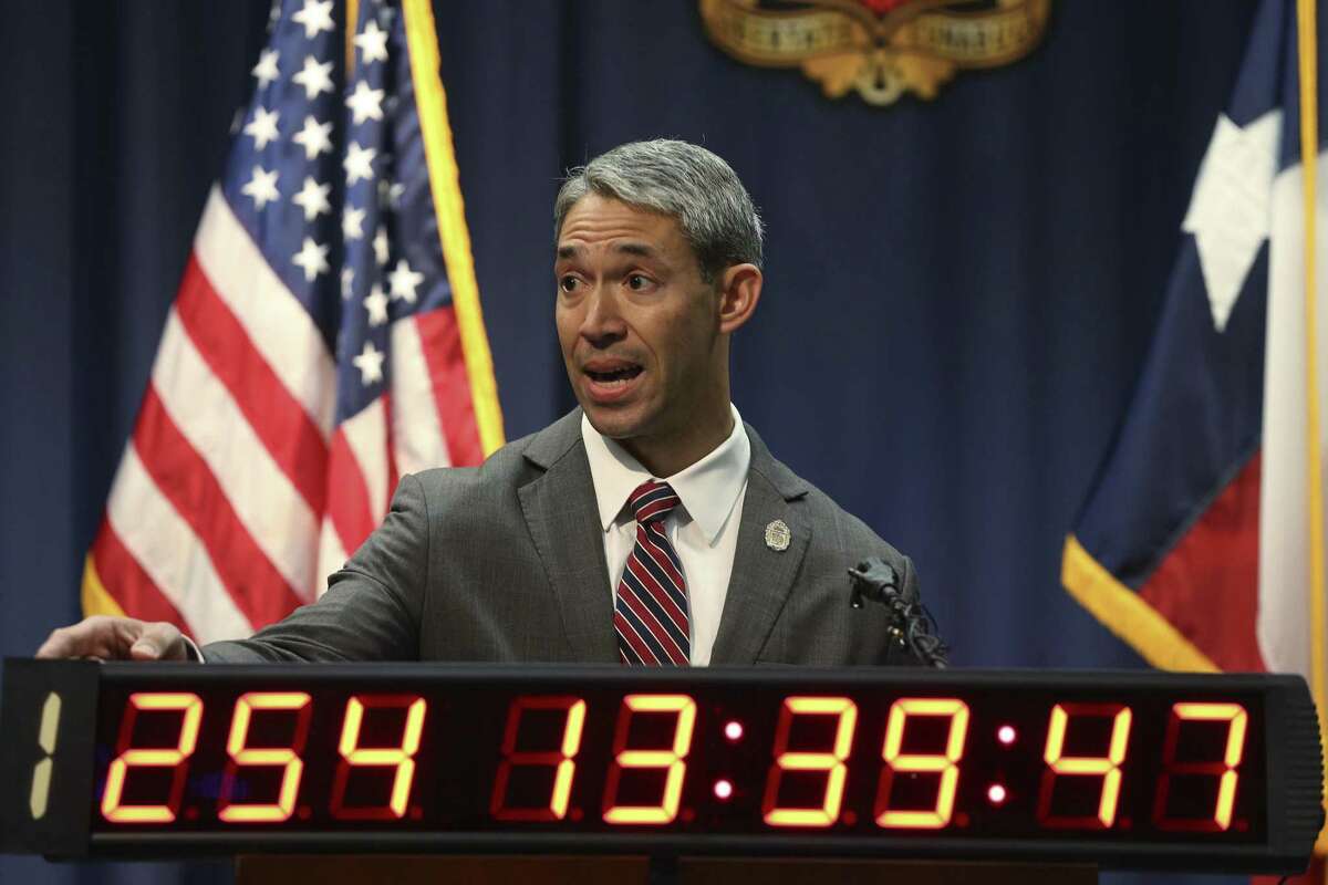 During a press conference, San Antonio Mayor Ron Nirenberg points to a clock counting the days since the firefighters contract expired, Wednesday, March 7, 2018. Nirenberg said that another letter was sent to union asking them to come to the negotiating table.