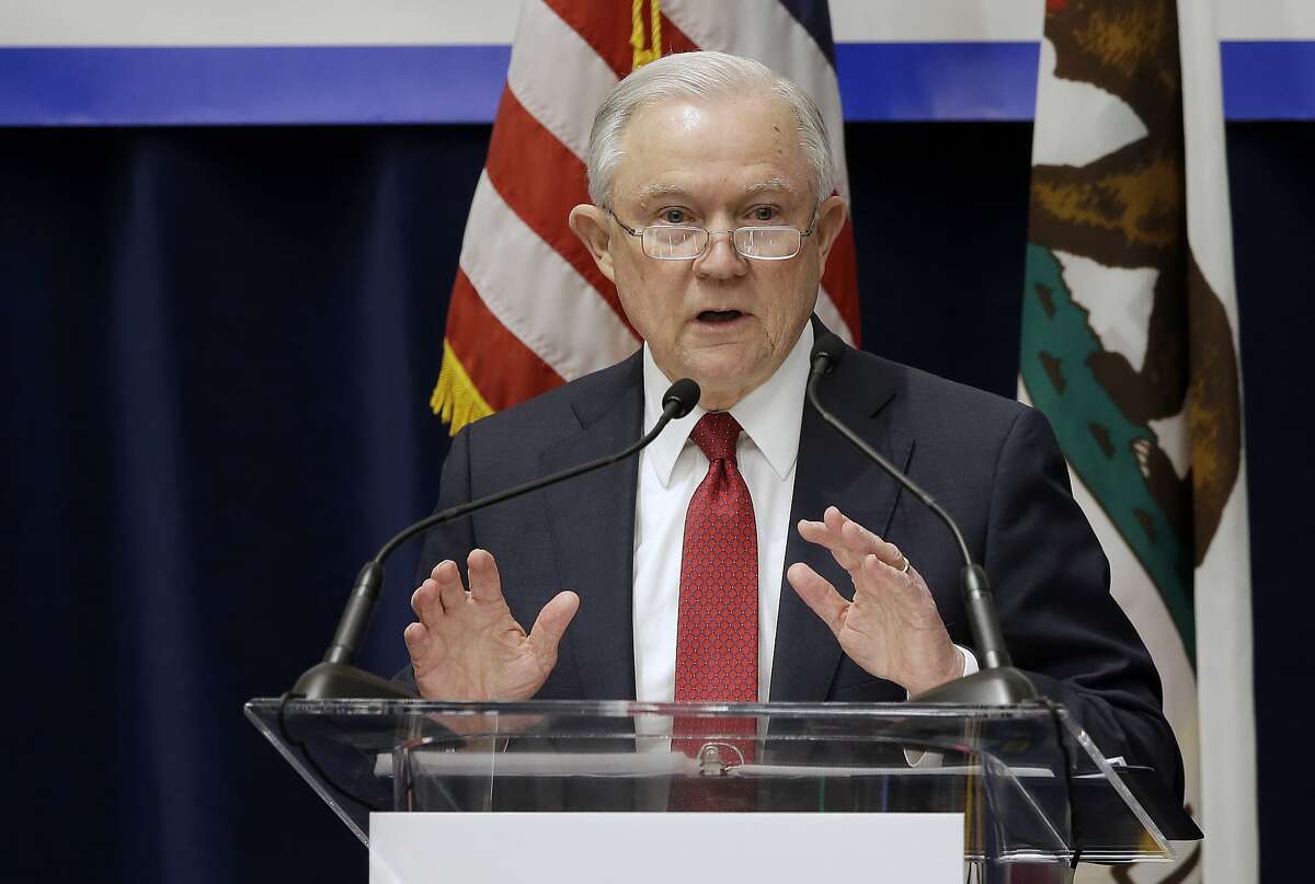 U.S. Attorney General Jeff Sessions addresses the California Peace Officers' Association 26th Annual Law Enforcement Legislative Day, 7, 2018, in Sacramento, Calif. The Trump administration on Tuesday sued to block California laws that extend protections to people living in the U.S. illegally. (AP Photo/Rich Pedroncelli)