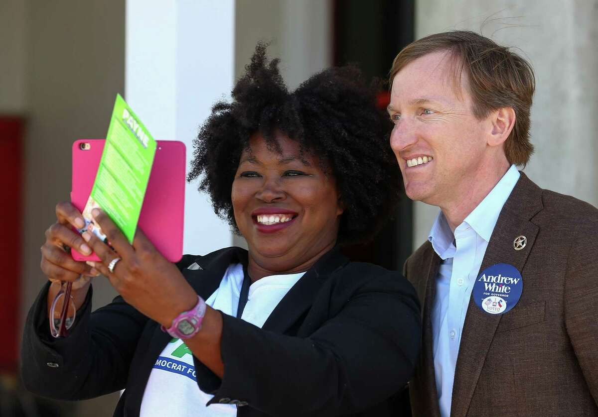 Latosha Payne takes a selfie with gubernatorial candidate Andrew White outside the West Gray Recreation Center Tuesday, March 6, 2018, in Houston. ( Godofredo A. Vasquez / Houston Chronicle )