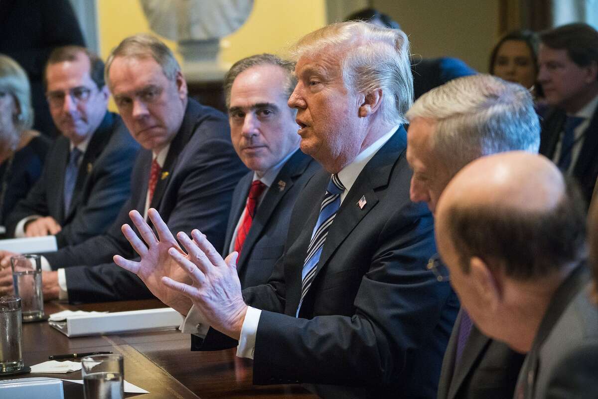 President Donald Trump speaks during a meeting with his Cabinet in the Cabinet Room at the White House, in Washington, March 8, 2018. The administration is expected to formally announce tariffs on Thursday despite pushback from Republican lawmakers and as officials began signaling carve-outs for certain countries. At Trump's immediate left is Secretary of Veterans Affairs David Shulkin. (Doug Mills/The New York Times)