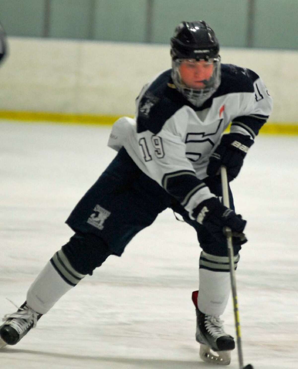 Division III skater of the year Sam New looks to lead top-seeded Staples over Newington in the quarterfinals.