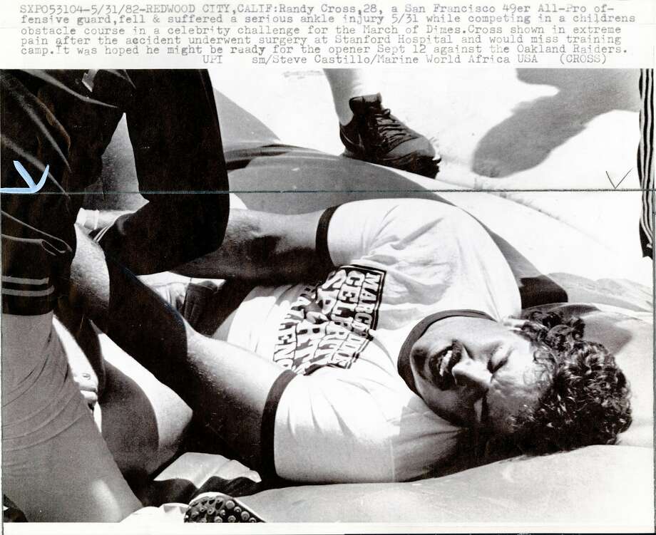 49ers guard Randy Cross injured his ankle in Whale of a Time World at Marine World Africa U.S.A. June 1, 1982 Photo: UPI