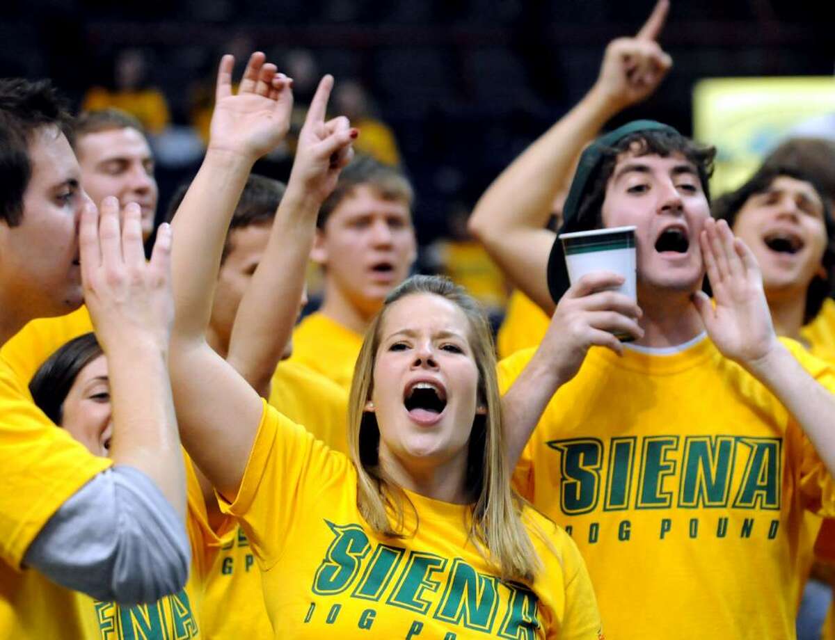 Siena's student section cheers for their team during their game against Northeastern. (Cindy Schultz / Times Union)
