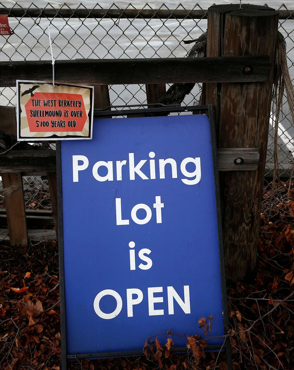 A sign claiming the location�s historical significance hangs at a parking lot slated for development across from Spenger's restaurant on Fourth Street in Berkeley, Calif. on Thursday, March 8, 2018. Opponents of the project say the site is a sacred Ohlone Indian shellmound burial site.