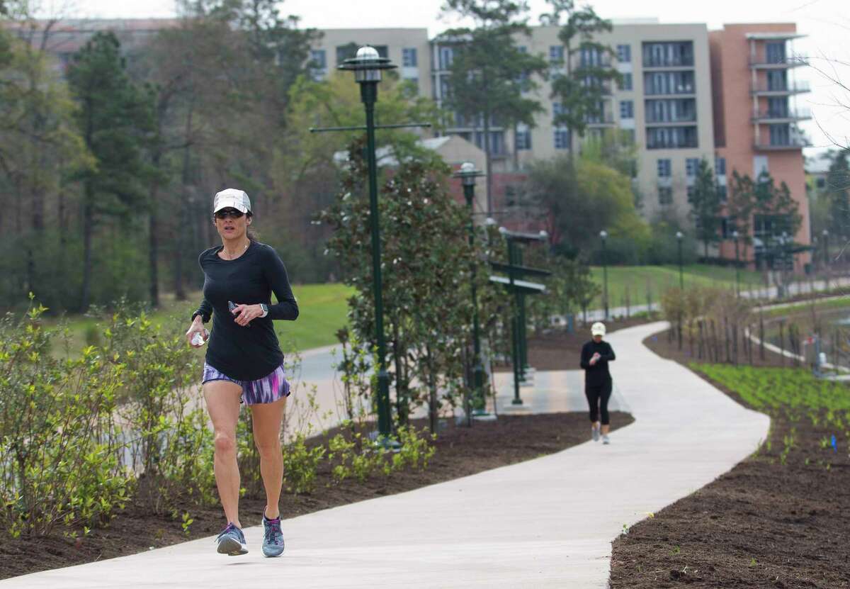 The Woodlands was ranked the 7th best city to live in the United States. Here is a slideslow with some reasons why people love to call The Woodlands home. Here, a woman runs through part of the The Woodlands Waterway, an 18-year project combining commercial and residential centers with a 1.8 mile transit and pedestrian corridor through The Woodlands Town Center, Thursday, March 8, 2018, in The Woodlands.