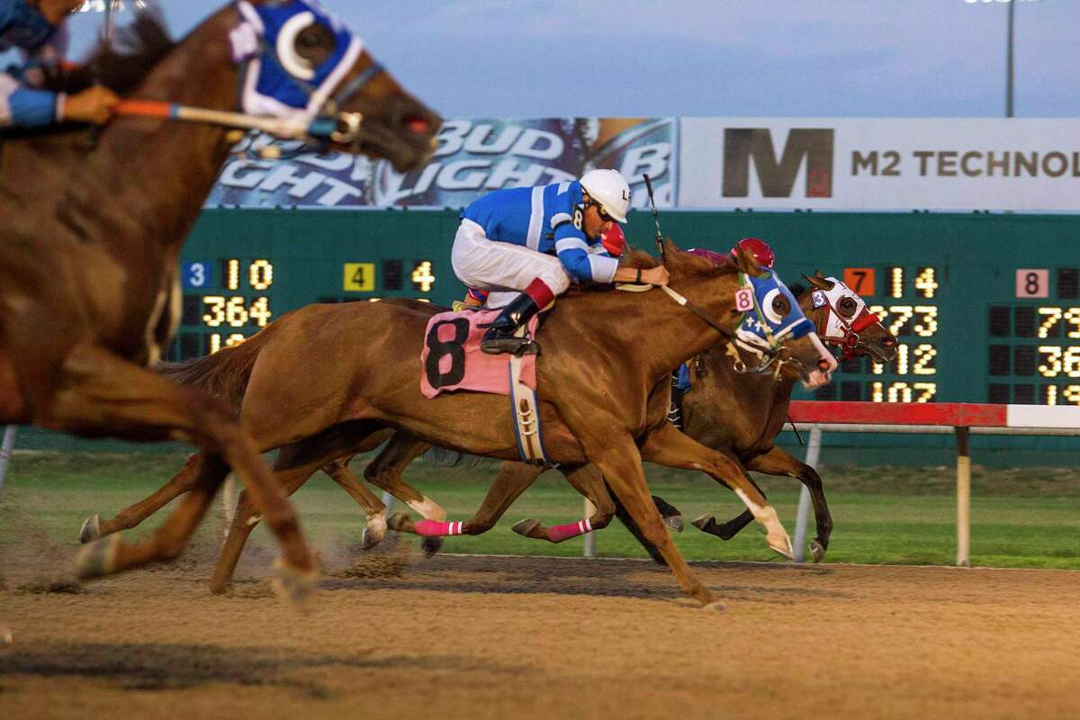 The U.S. Supreme Court this week refused to review an appeal of a securities fraud case against the one-time chairman and controlling shareholder of a company that used to operate Selma's Retama Park horse track. Pictured is a 2015 horse race at the track.