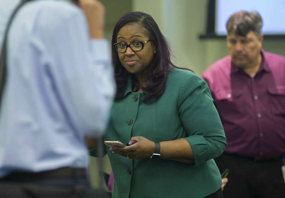 In this file photo, Grenita Lathan, the chief academic officer at Houston Independent School District, talks to attendees before an HISD school board meeting, Thursday, March 8, 2018, in Houston. Lathan was appointed interim superintendent on March 22, 2018. ( Mark Mulligan / Houston Chronicle )